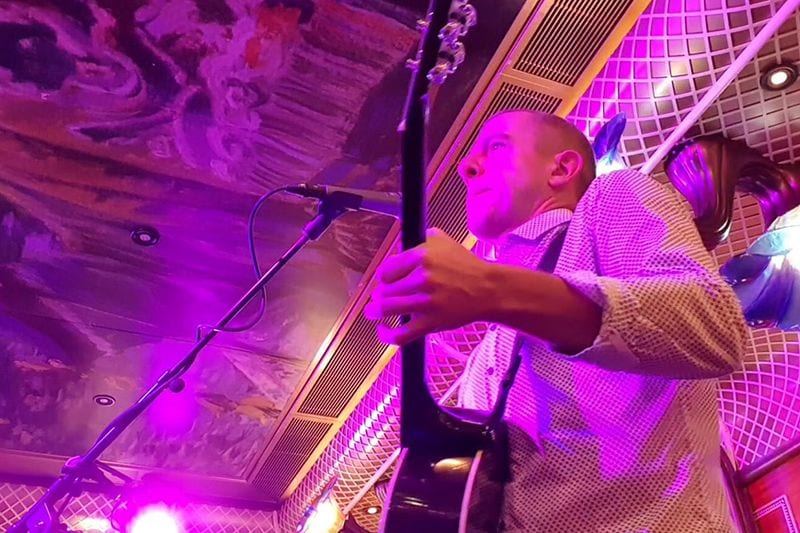 Darren Scott performing on board a Carnival cruise ship